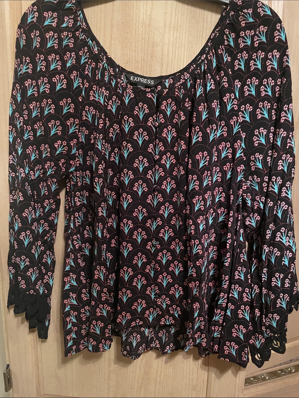 Express Black Long Sleeve Scoop Neck Top with Pink and Teal Floral Motif